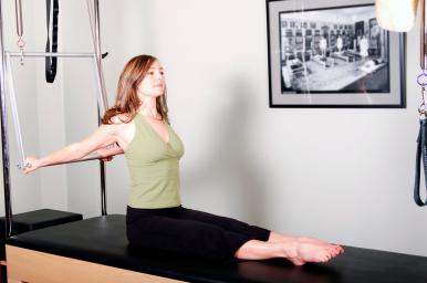 Instructor de Pilates máquina Reformer